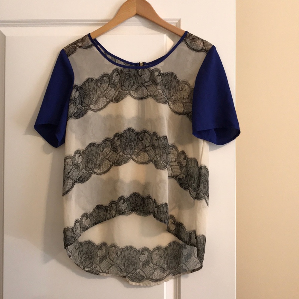 Shear cream/black blouse